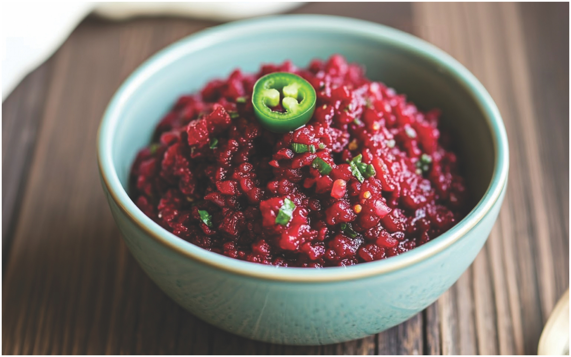 Fresh cranberry-jalapeño relish in a bowl.